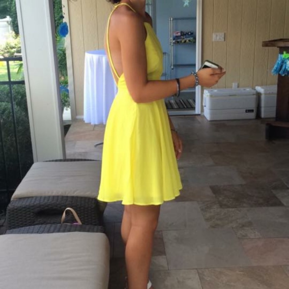Super cute yellow strapped back dress